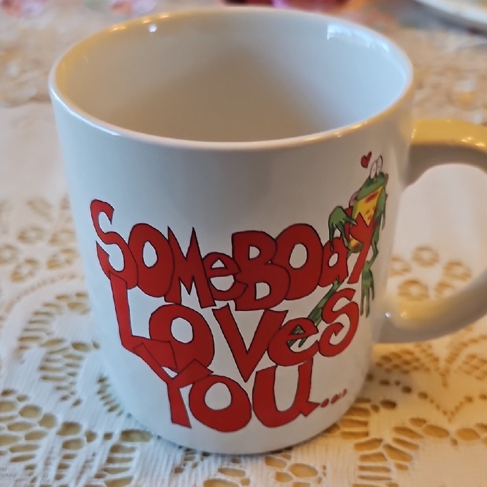 White Ceramic 'Somebody Loves You' Mug with Red Text and Frog Accent
